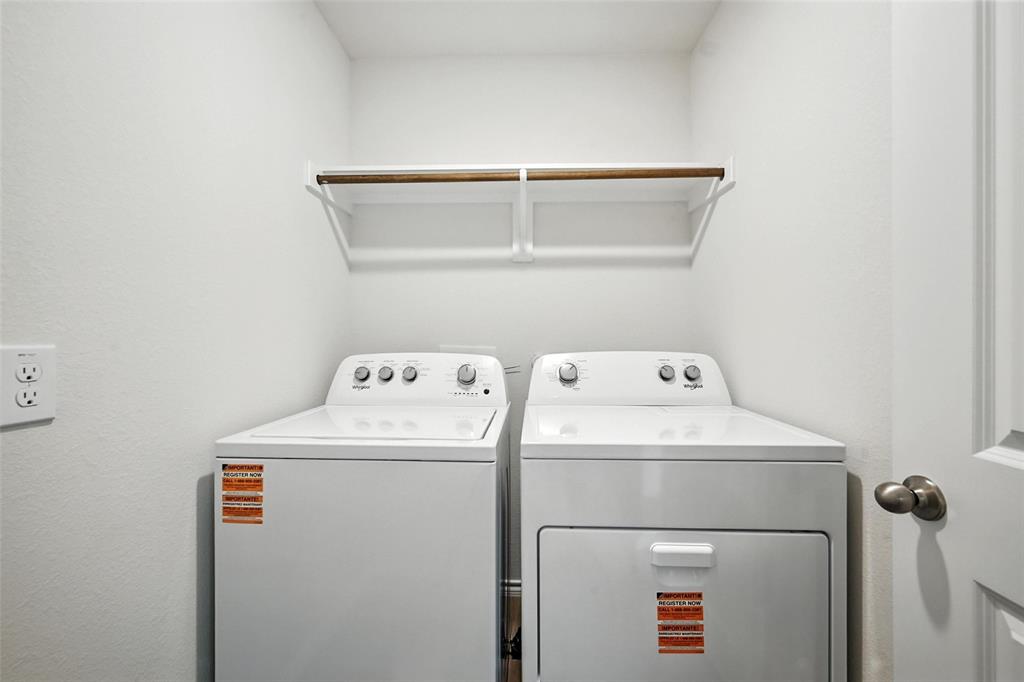 405 Regiment Road Sherman, TX 75090 - Photo 16 of 22 a utility room with dryer and washer