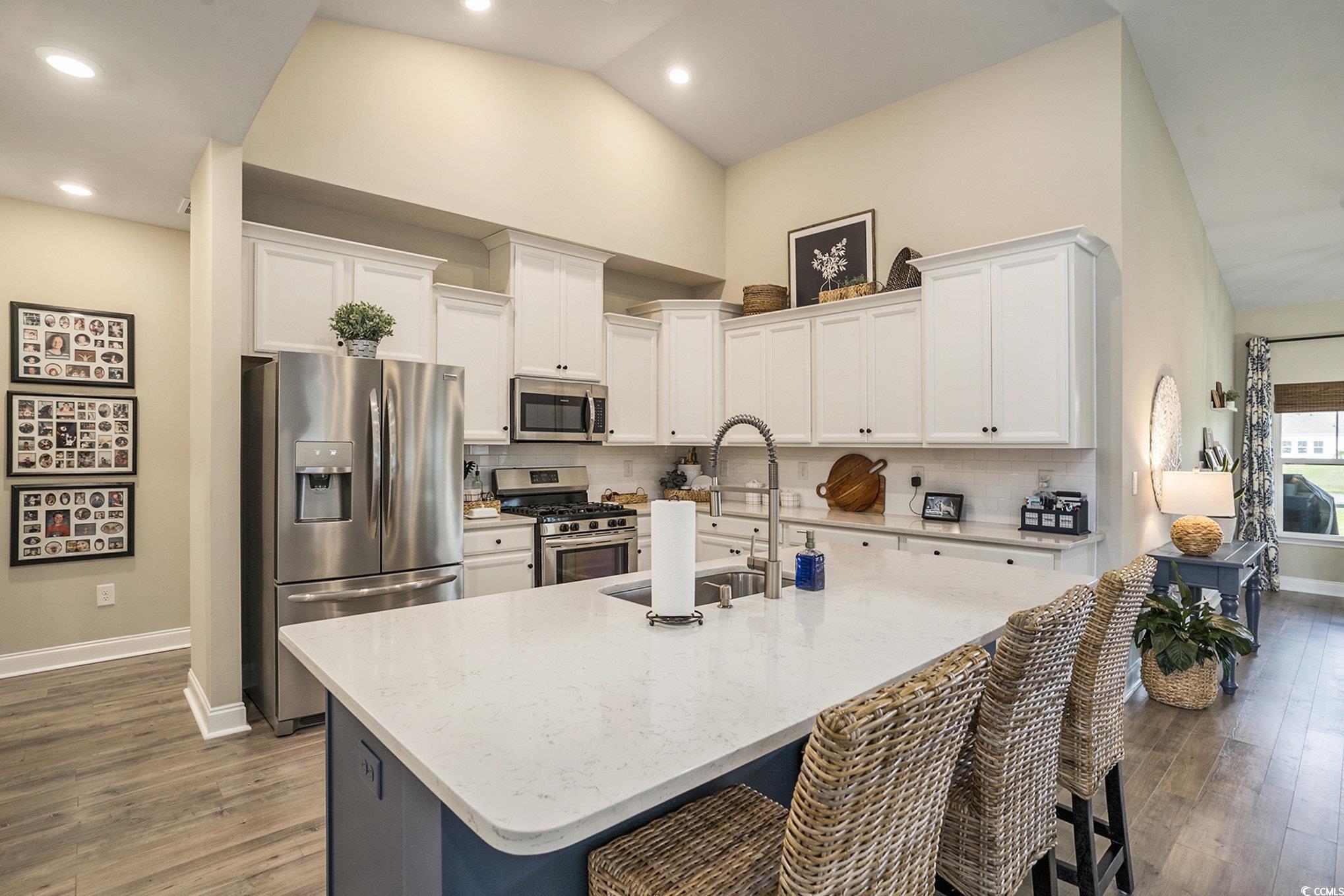 860 Brant Street Myrtle Beach, SC 29579 - Photo 15 of 40 Kitchen with stainless steel appliances, wood fini