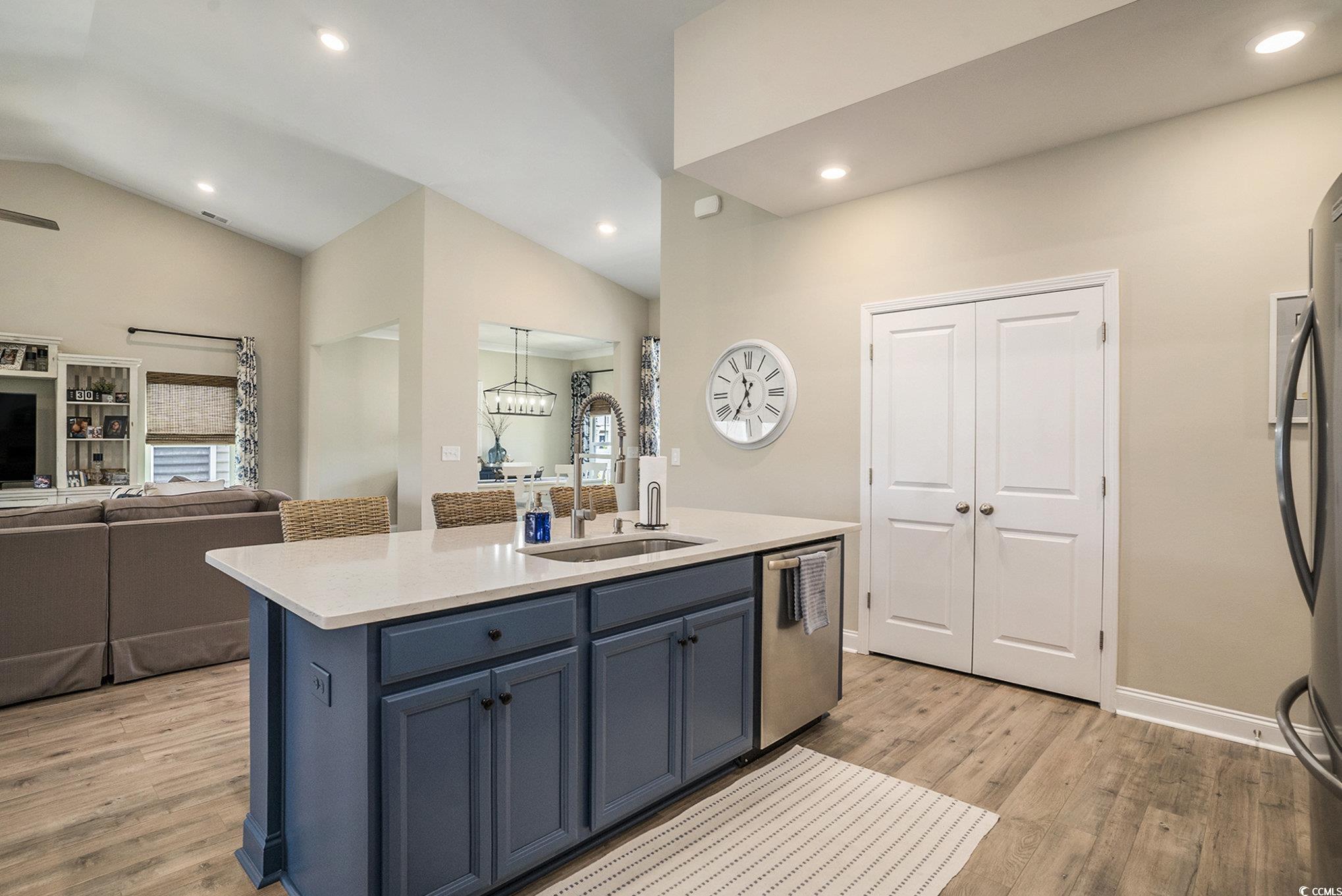860 Brant Street Myrtle Beach, SC 29579 - Photo 16 of 40 Kitchen with stainless steel appliances, light woo