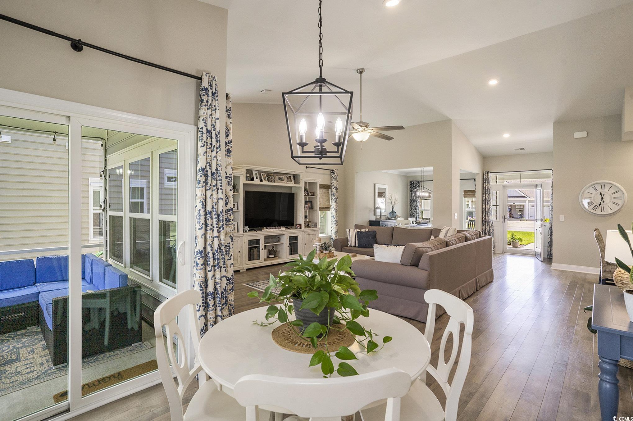 860 Brant Street Myrtle Beach, SC 29579 - Photo 18 of 40 Dining room featuring a chandelier, wood finished