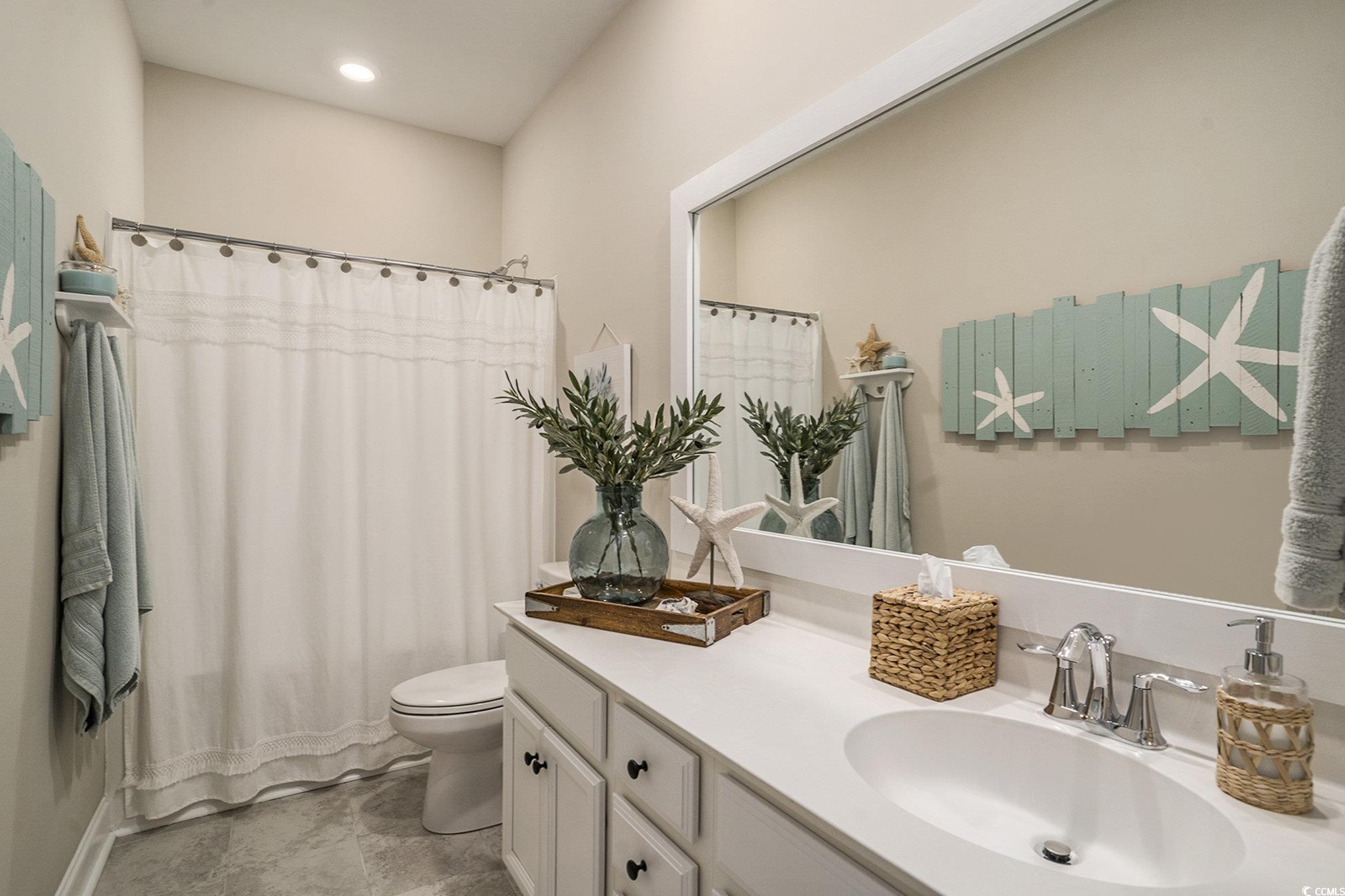 860 Brant Street Myrtle Beach, SC 29579 - Photo 19 of 40 Bathroom featuring toilet and vanity