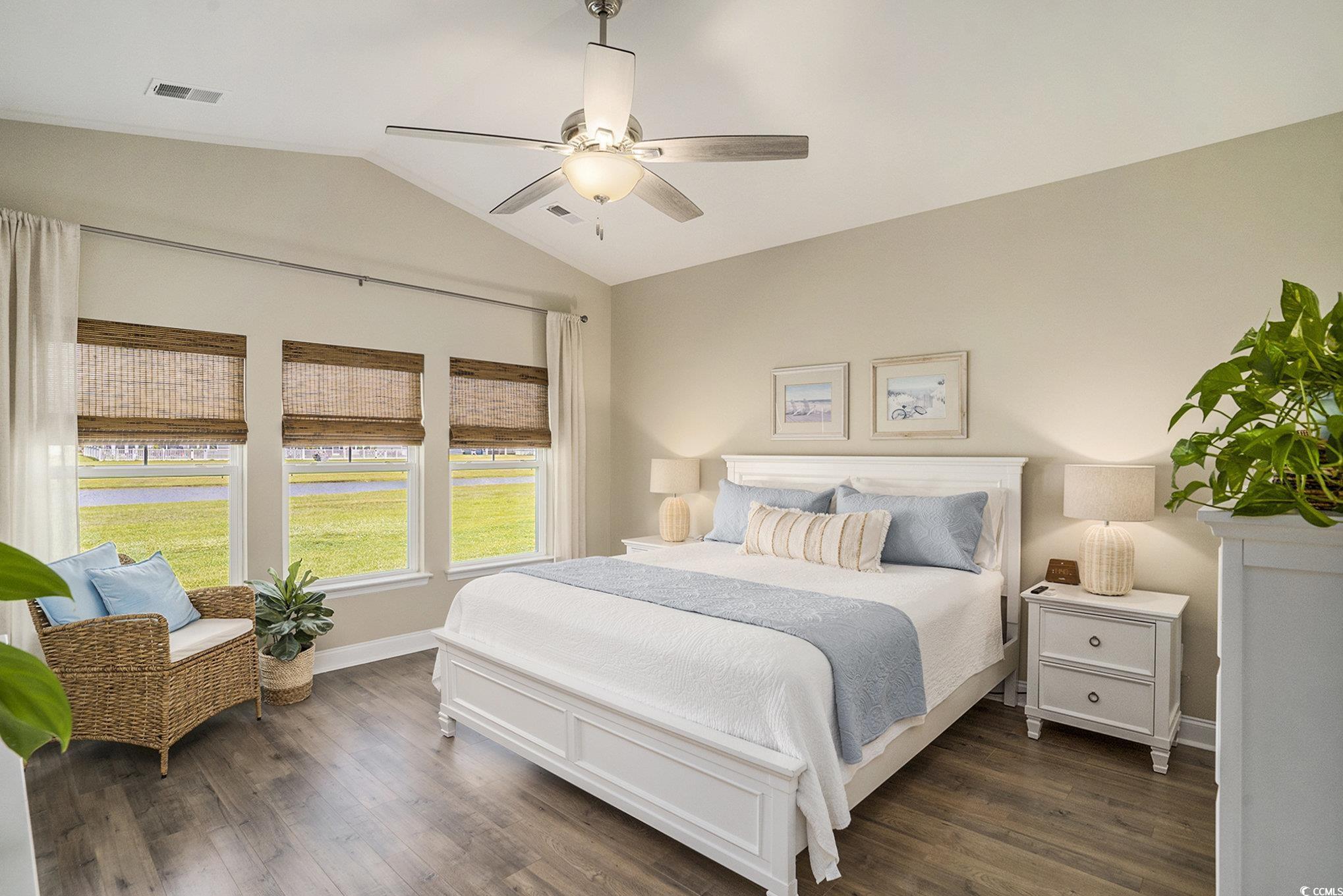 860 Brant Street Myrtle Beach, SC 29579 - Photo 20 of 40 Bedroom with lofted ceiling, dark wood finished fl