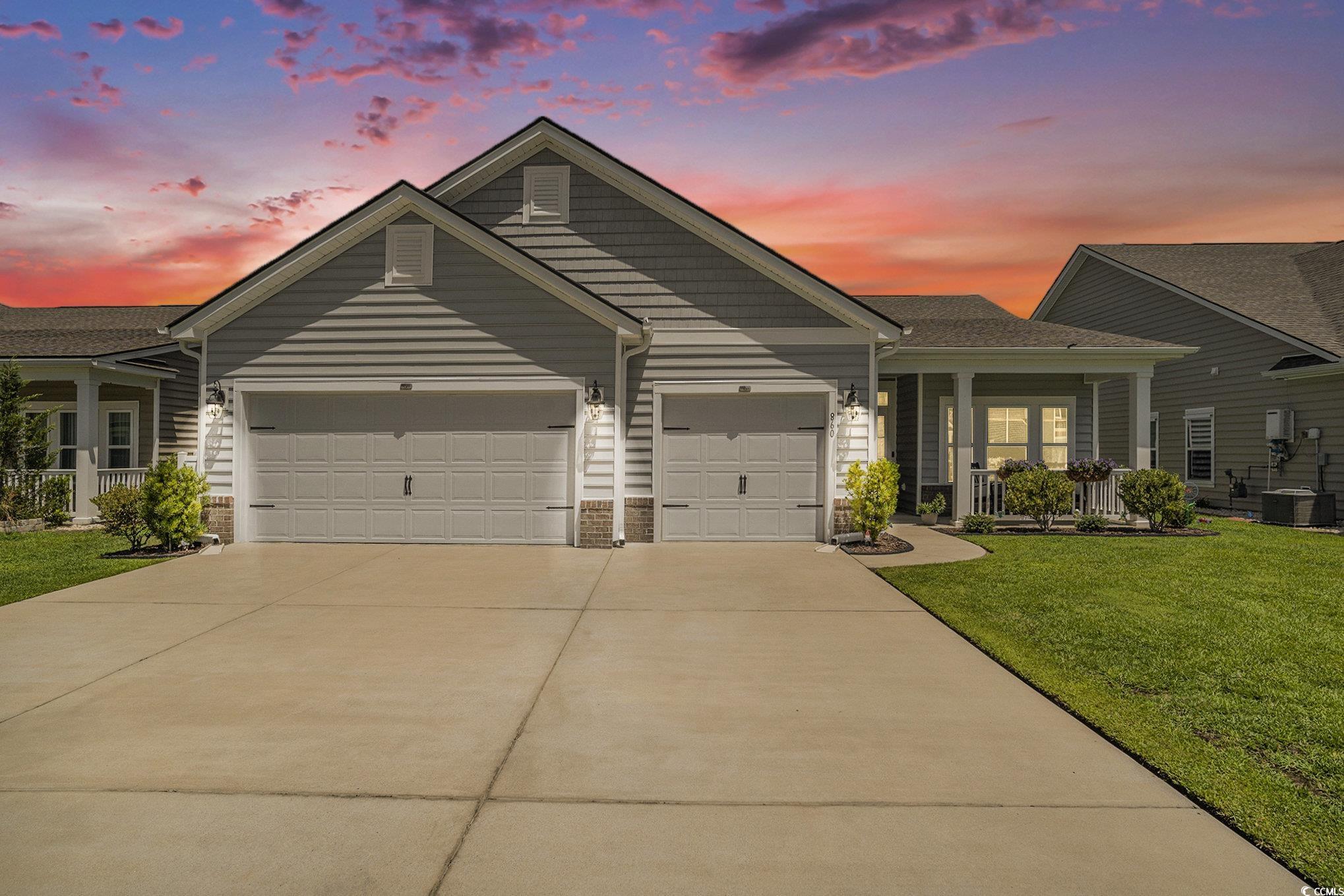 860 Brant Street Myrtle Beach, SC 29579 - Photo 2 of 40 Ranch-style home featuring a garage, a porch, a fr