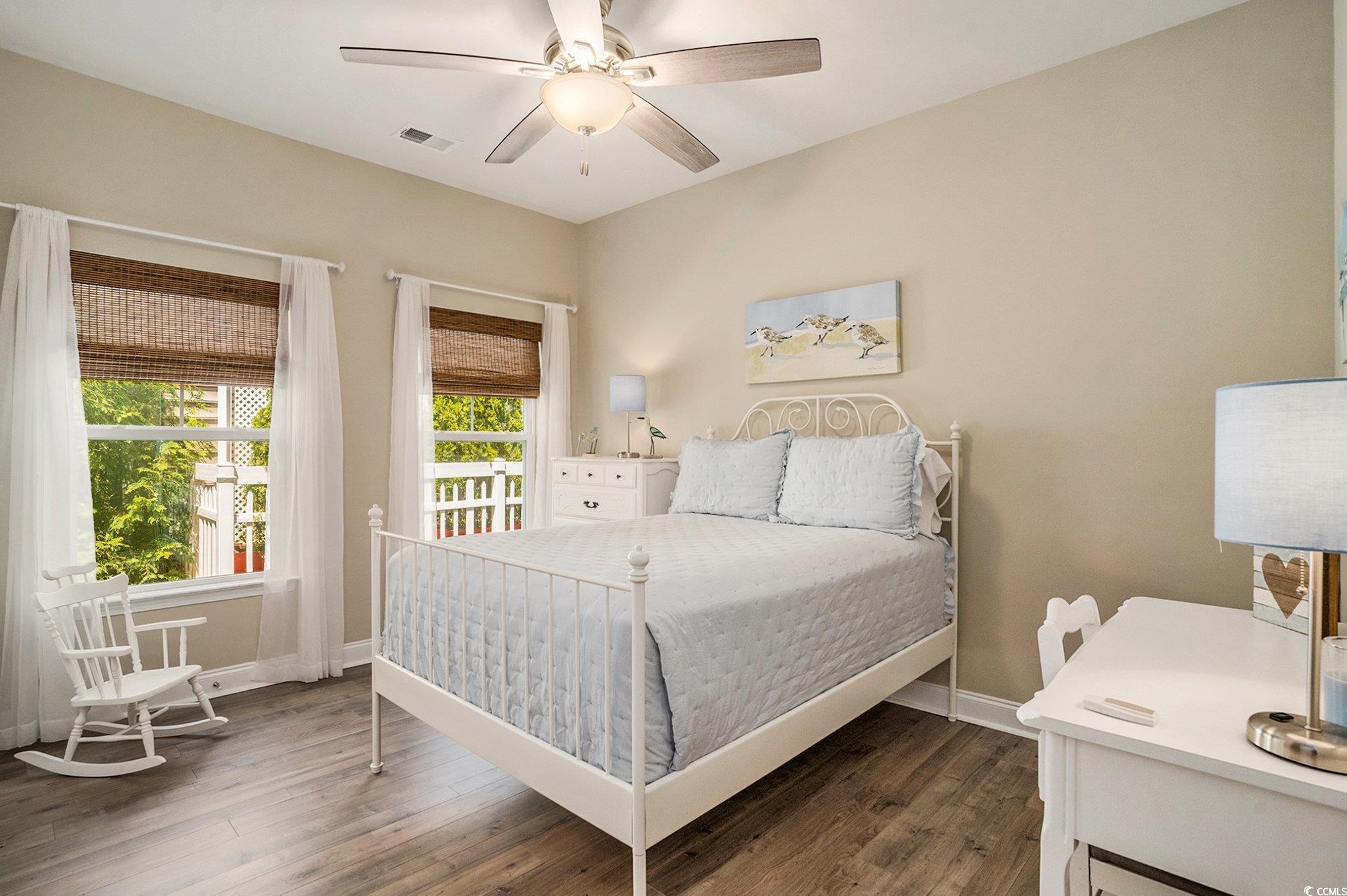 860 Brant Street Myrtle Beach, SC 29579 - Photo 25 of 40 Bedroom featuring wood finished floors and a ceili