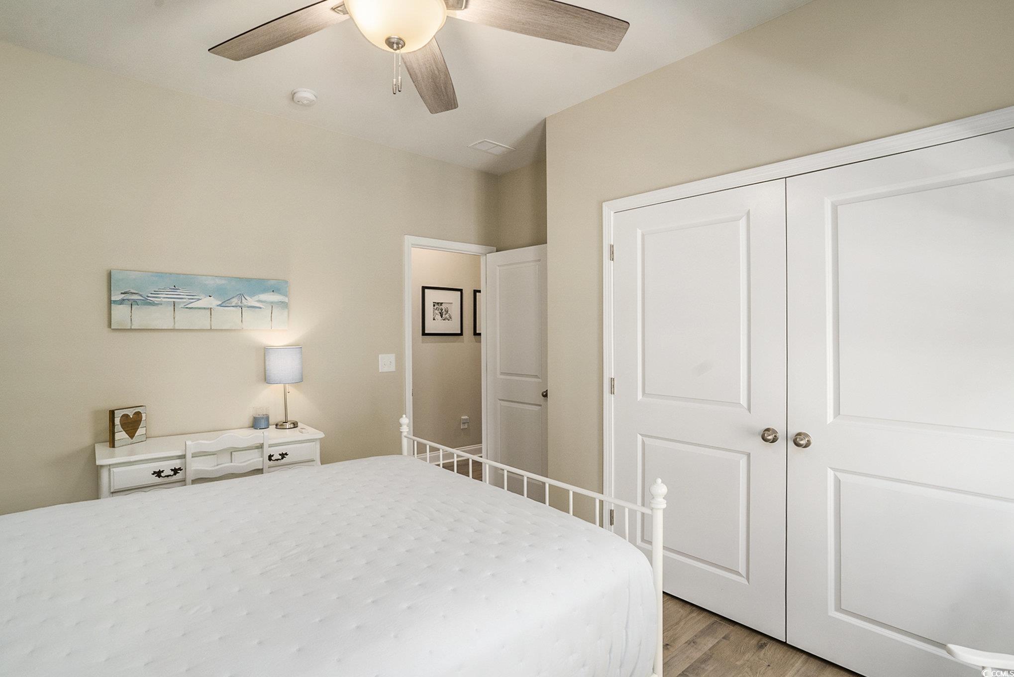 860 Brant Street Myrtle Beach, SC 29579 - Photo 26 of 40 Bedroom featuring light wood-type flooring, ceilin