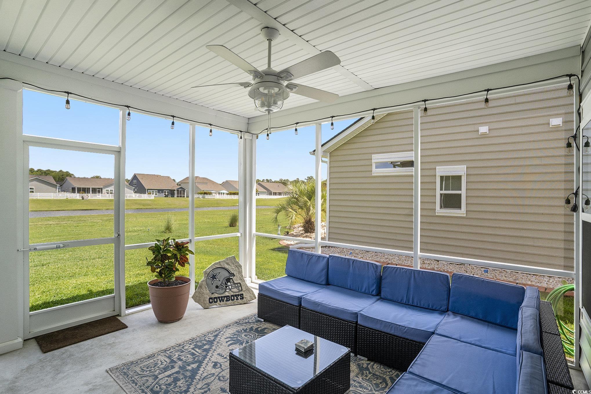 860 Brant Street Myrtle Beach, SC 29579 - Photo 28 of 40 Sunroom with a ceiling fan, outdoor lounge area, a