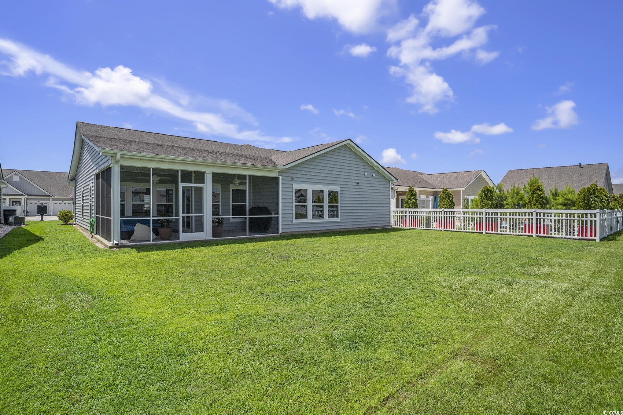 860 Brant Street Myrtle Beach, SC 29579 - Photo 30 of 40 Back of house featuring a fenced backyard and a su