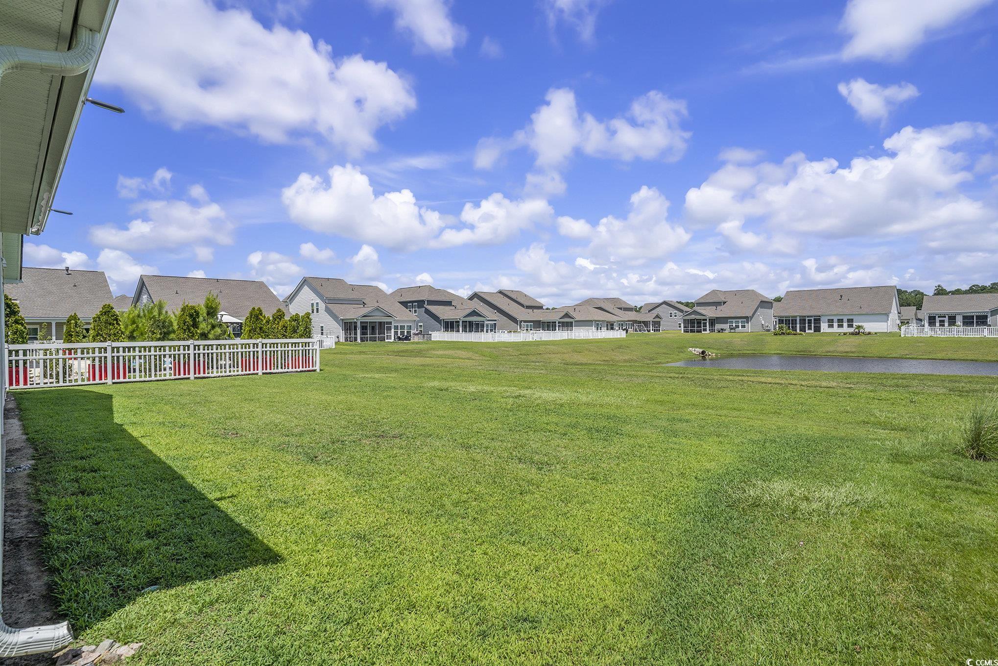 860 Brant Street Myrtle Beach, SC 29579 - Photo 31 of 40 View of yard featuring a residential view and a wa