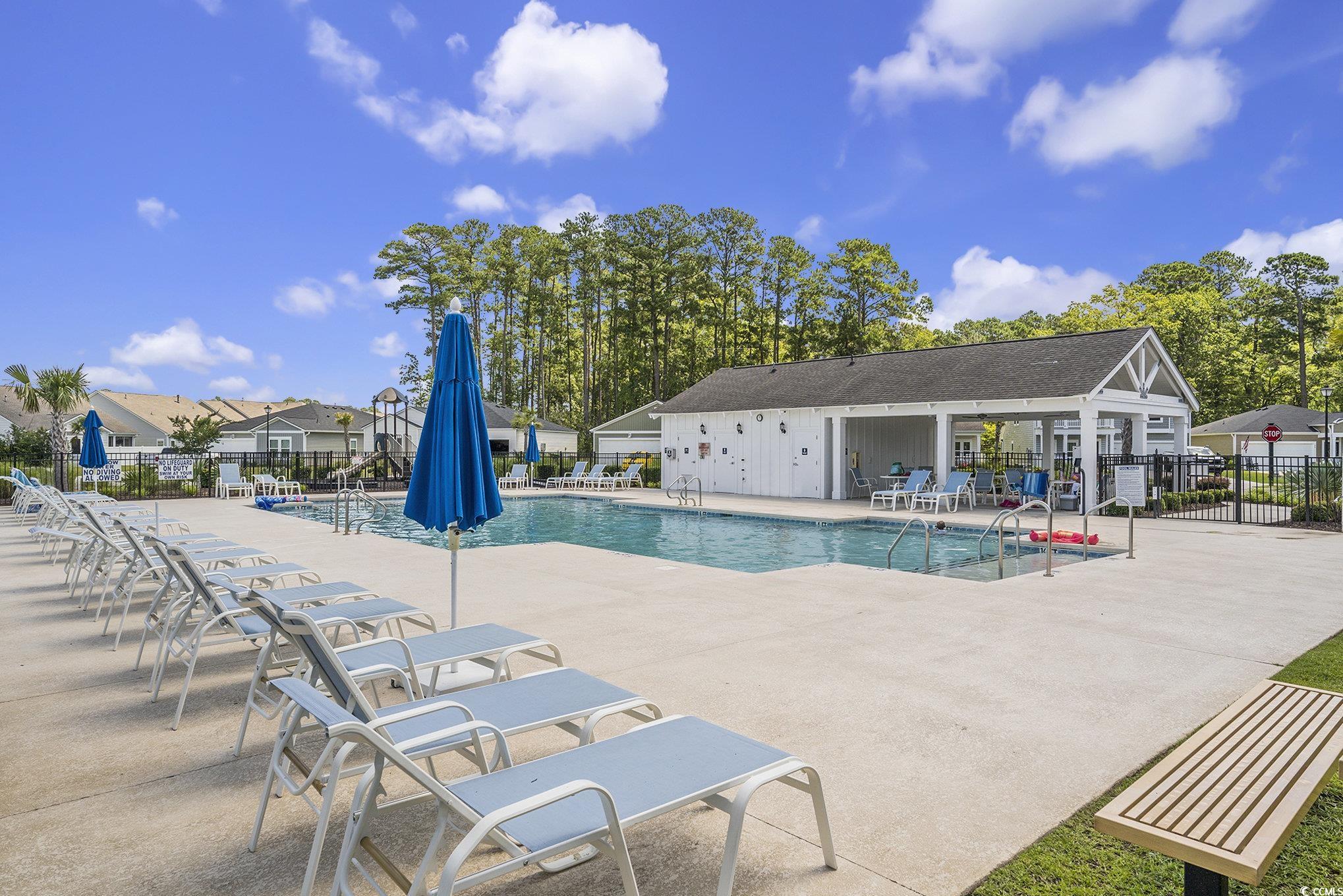 860 Brant Street Myrtle Beach, SC 29579 - Photo 38 of 40 Community pool featuring a patio area