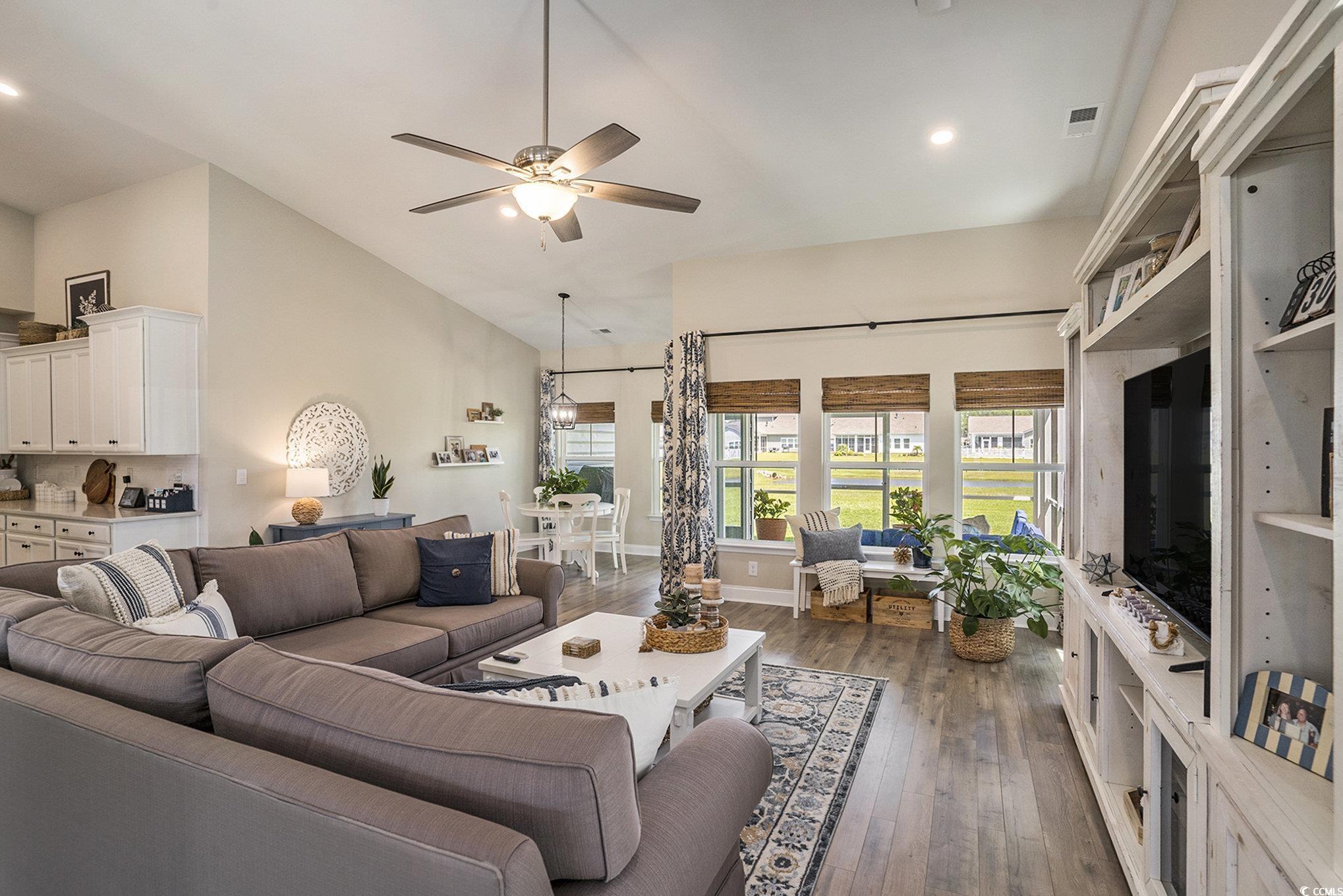 860 Brant Street Myrtle Beach, SC 29579 - Photo 9 of 40 Living room with a ceiling fan, dark wood finished