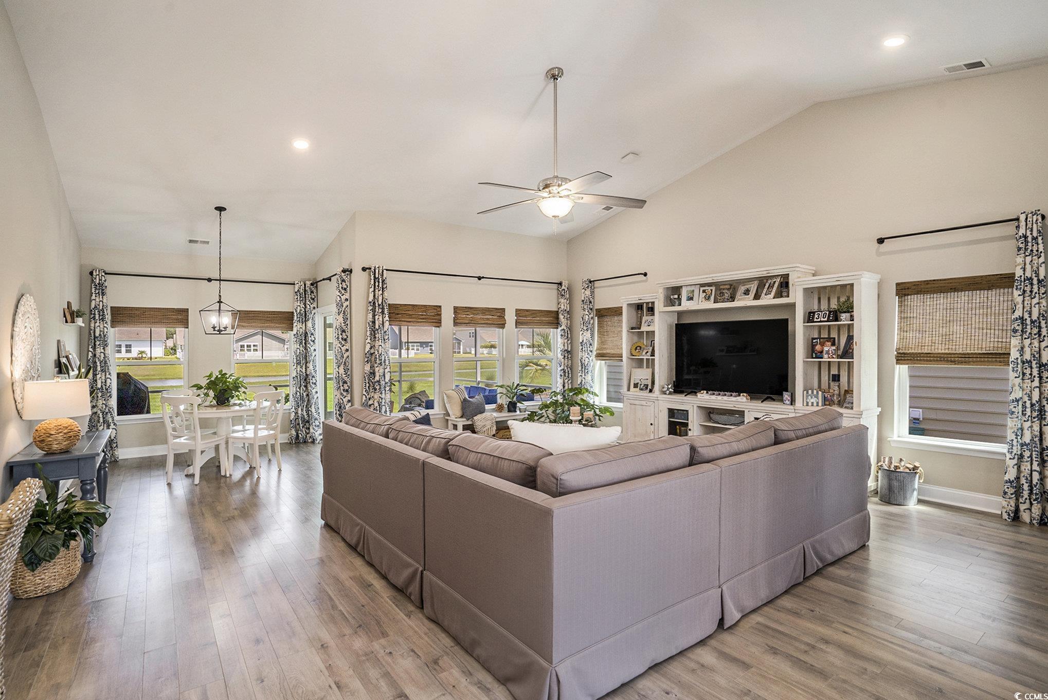 860 Brant Street Myrtle Beach, SC 29579 - Photo 10 of 40 Living area featuring ceiling fan, light wood fini