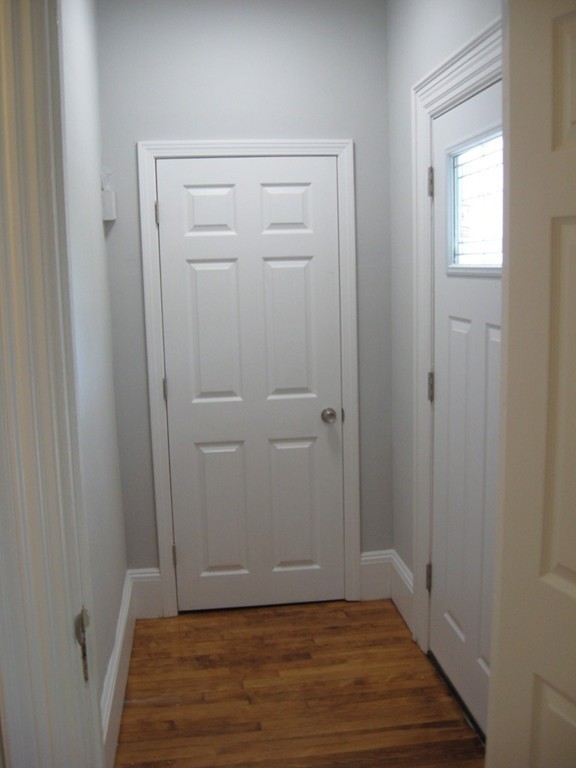 114 Ridge Street Fall River, MA 02721 - Photo 4 of 34 wooden floor in an empty room