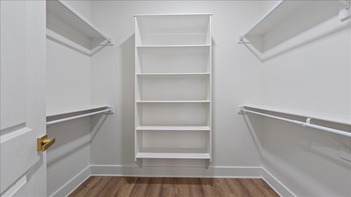 1072 Bruce Street Memphis, TN 38104 - Photo 25 of 27 a view of walk in closet with empty racks