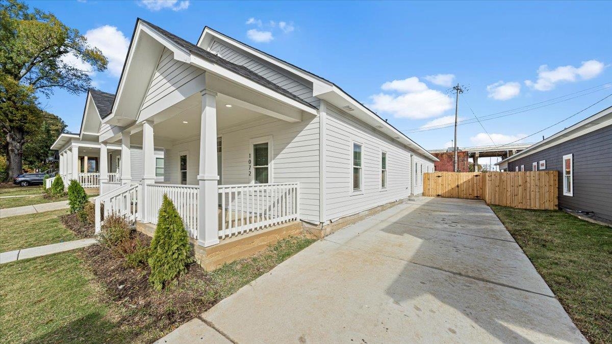 1072 Bruce Street Memphis, TN 38104 - Photo 3 of 27 a view of a house with a yard