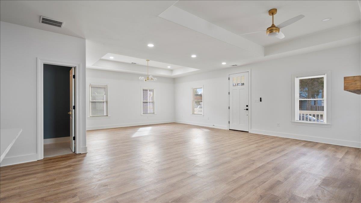 1072 Bruce Street Memphis, TN 38104 - Photo 7 of 27 a view of an empty room with wooden floor and a window