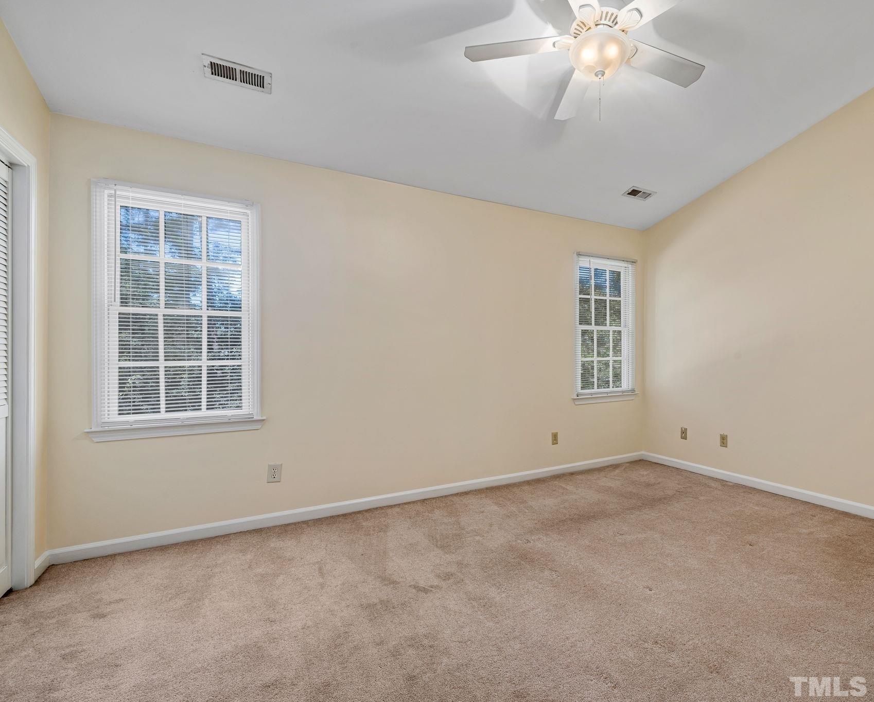 4544 Antique Lane Raleigh, NC 27616 - Photo 15 of 20 an empty room with windows