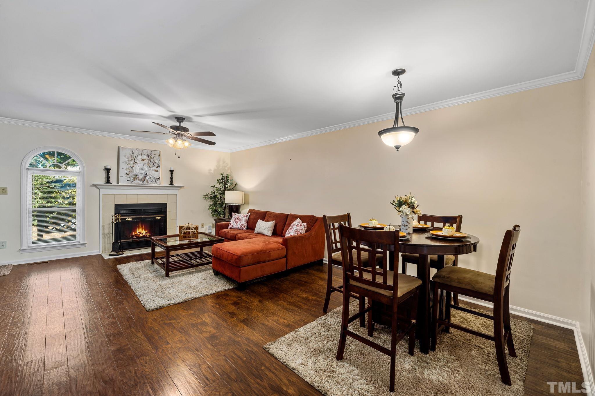 4544 Antique Lane Raleigh, NC 27616 - Photo 4 of 20 a view of a livingroom with furniture and a fireplace
