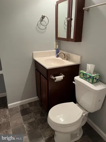 a bathroom with a sink and a toilet