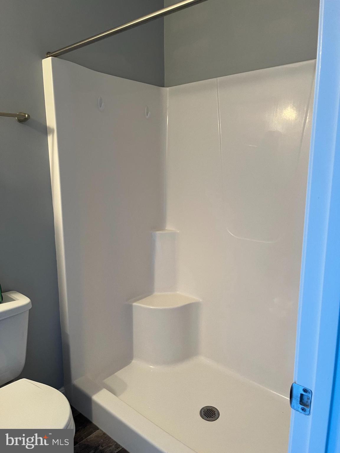 37 Winslow Ct. Gettysburg, PA 17325 - Photo 8 of 11 a white toilet sitting next to a shower