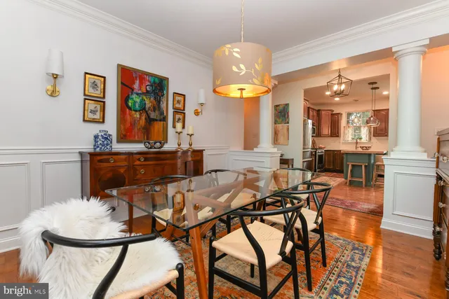 a view of a livingroom with furniture and wooden floor