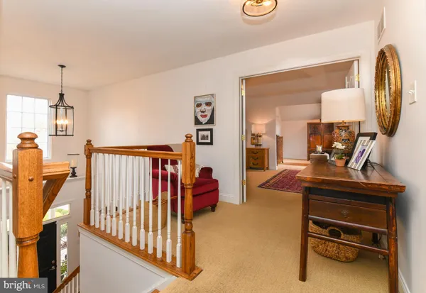 a view of a livingroom with furniture and a livingroom