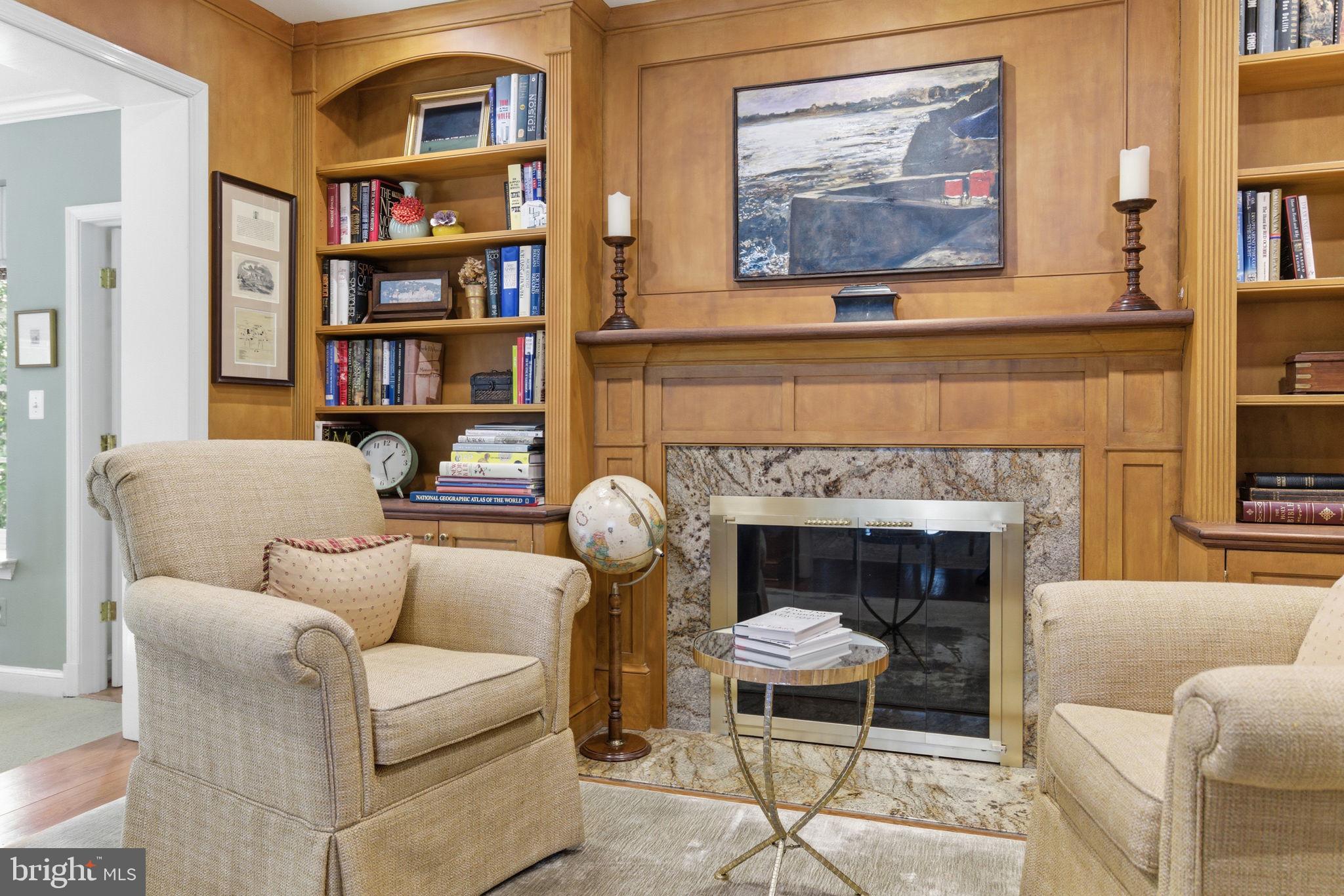 5310 Elliott Road Bethesda, MD 20816 - Photo 21 of 89 a living room with furniture and a fireplace
