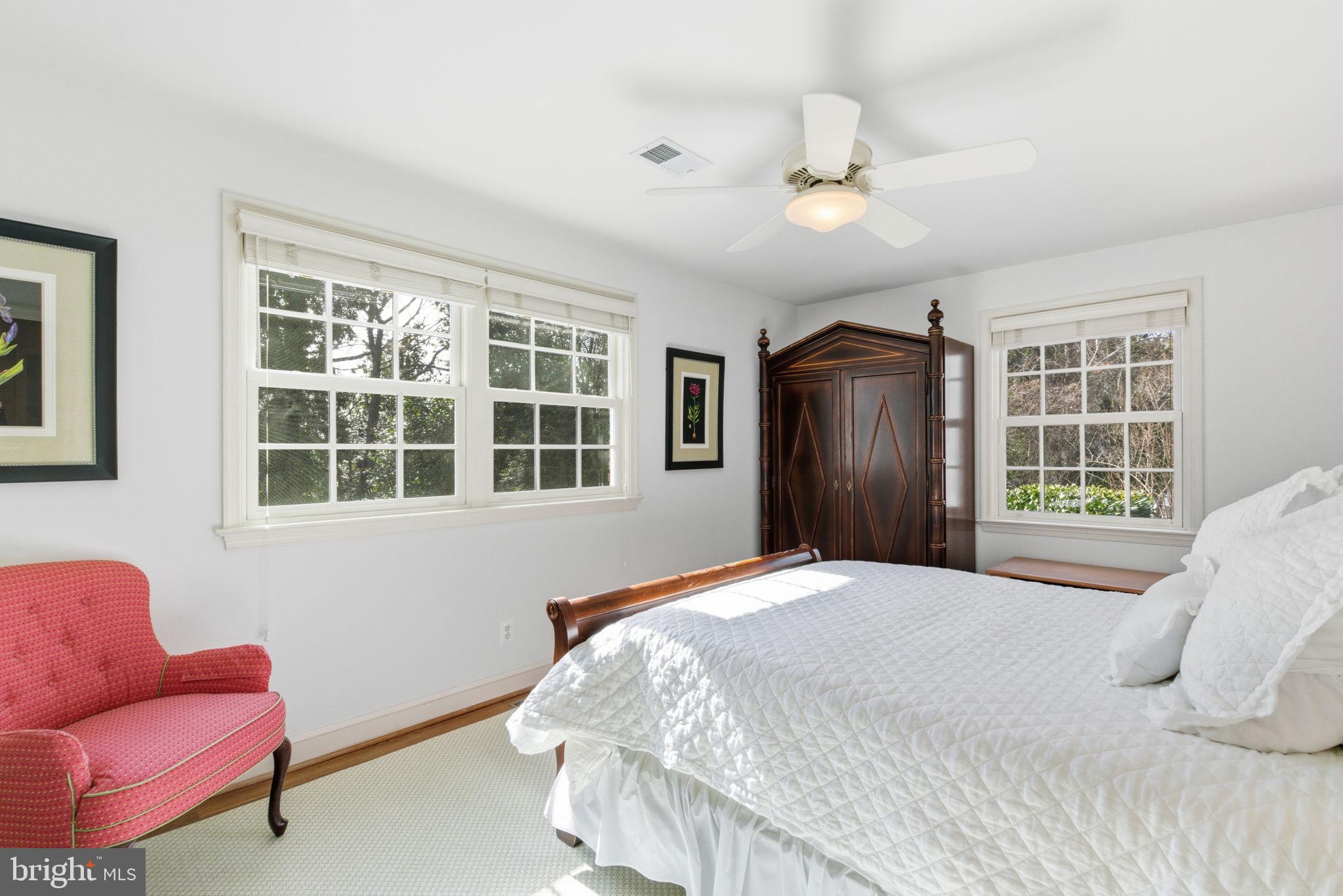 5310 Elliott Road Bethesda, MD 20816 - Photo 63 of 89 a bedroom with a bed and wooden floor