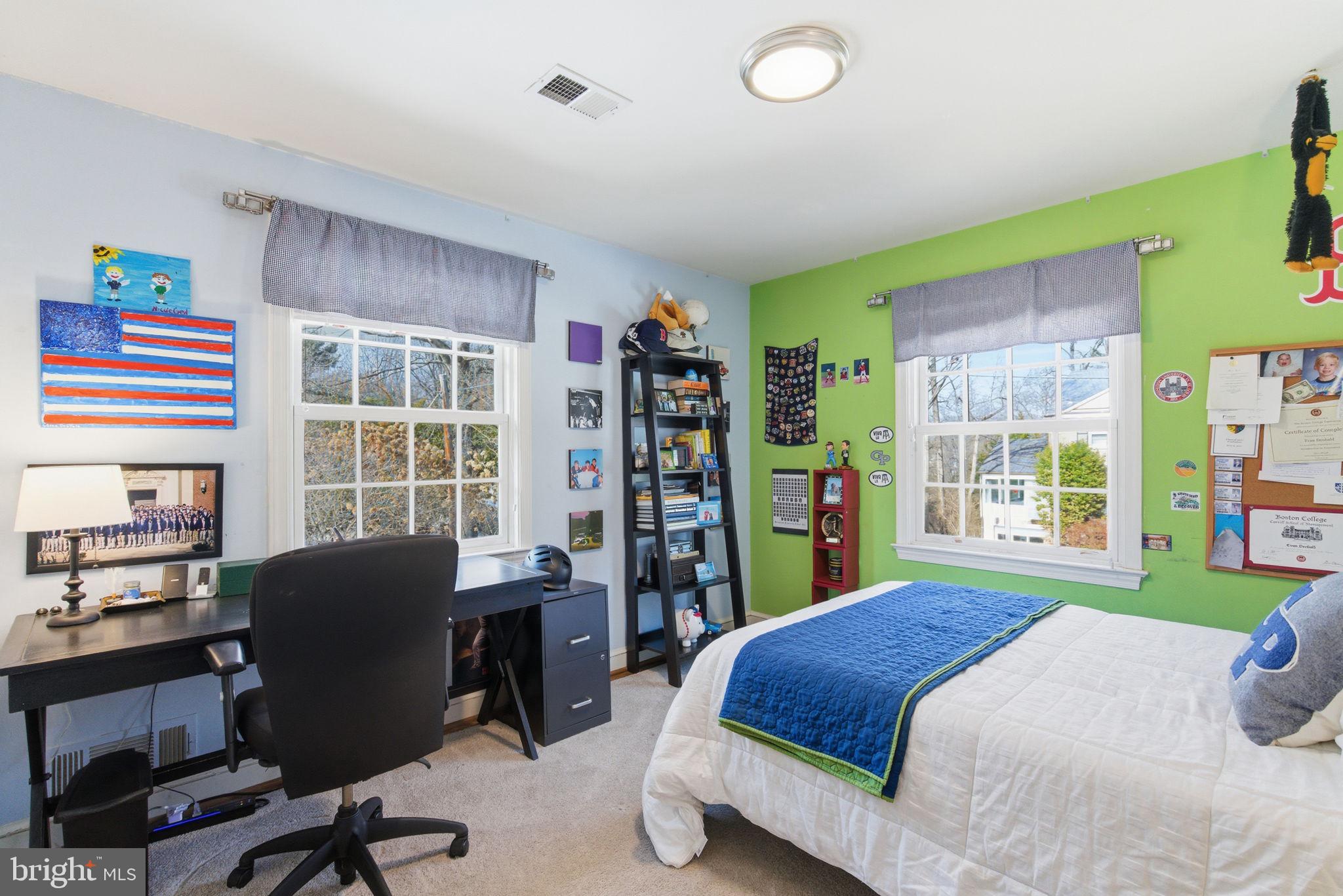 5310 Elliott Road Bethesda, MD 20816 - Photo 68 of 89 a bed room with a bed and a large window