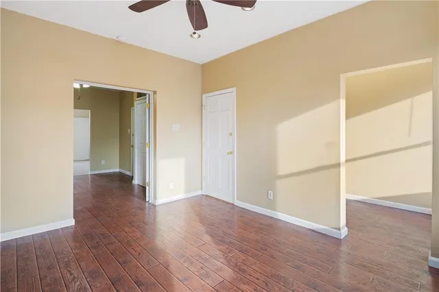 a view of a livingroom with wooden floor