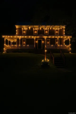 a view of open kitchen with granite countertop a sink and a stove