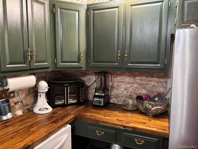a living room with furniture a window and a dining table