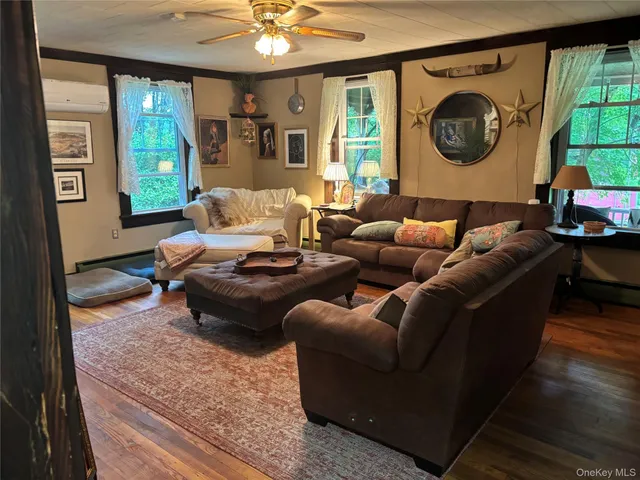 a bed room with a bed and a chair