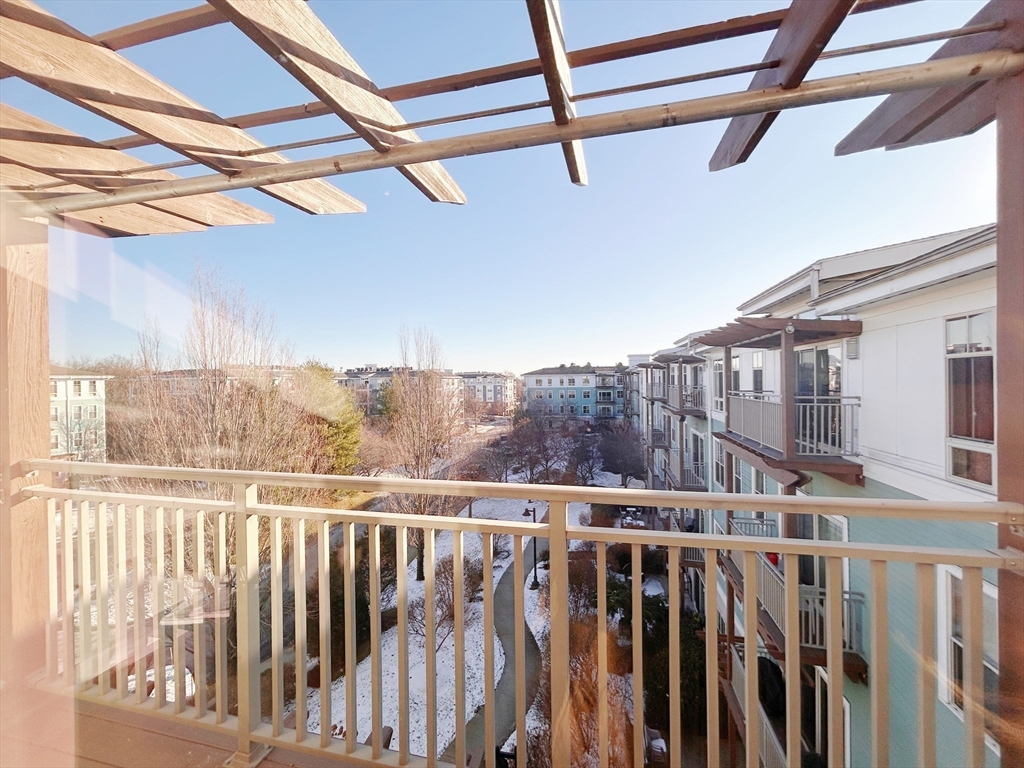 4 Repton Place, Unit 4415 Watertown, MA 02472 - Photo 19 of 25 a view of a city from a balcony