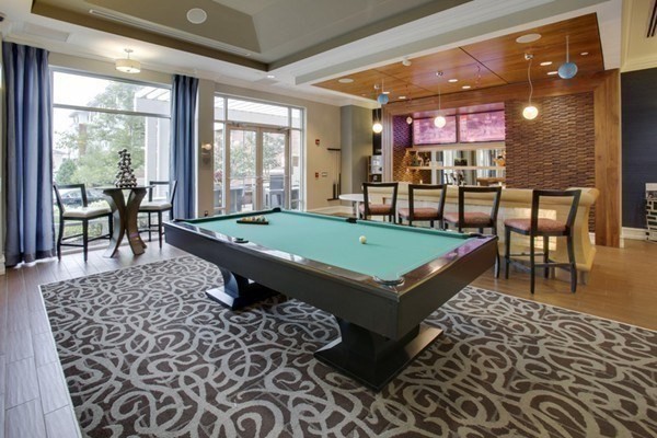 4 Repton Place, Unit 4415 Watertown, MA 02472 - Photo 23 of 25 a room with pool table and windows