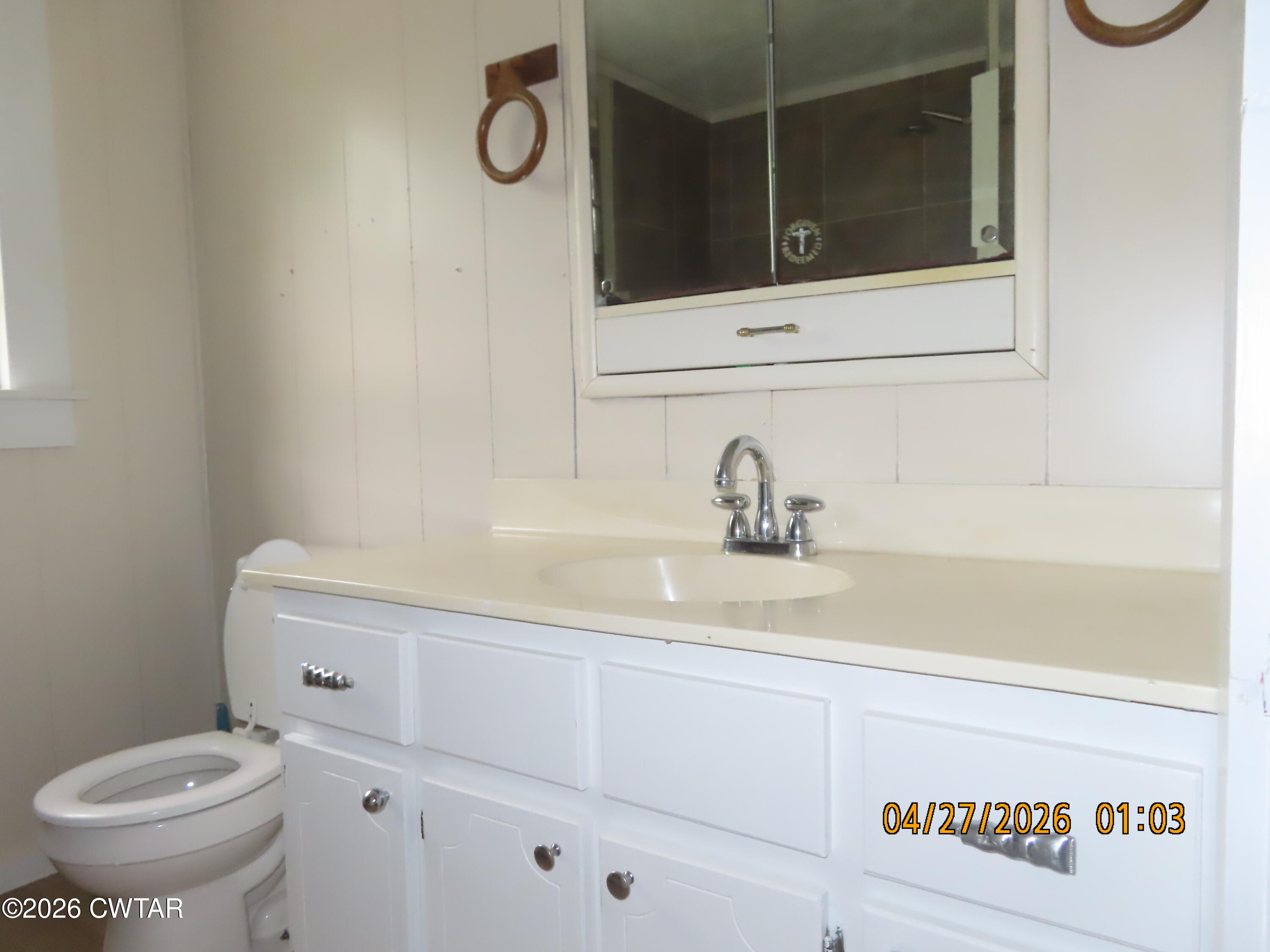 43 Bemis Lane Jackson, TN 38301 - Photo 14 of 18 a bathroom with a toilet and a sink