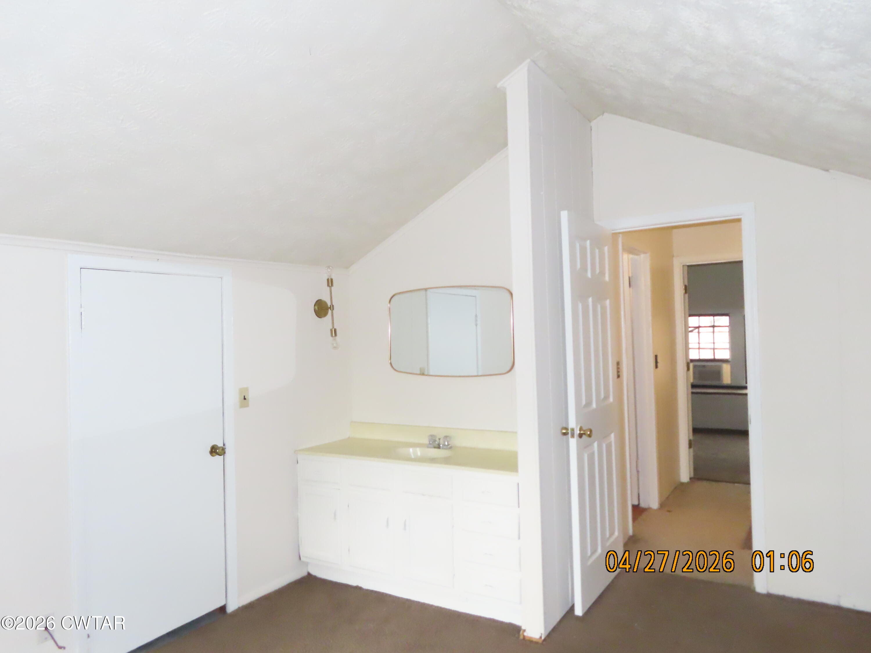 43 Bemis Lane Jackson, TN 38301 - Photo 17 of 18 a bathroom with a sink a toilet and shower