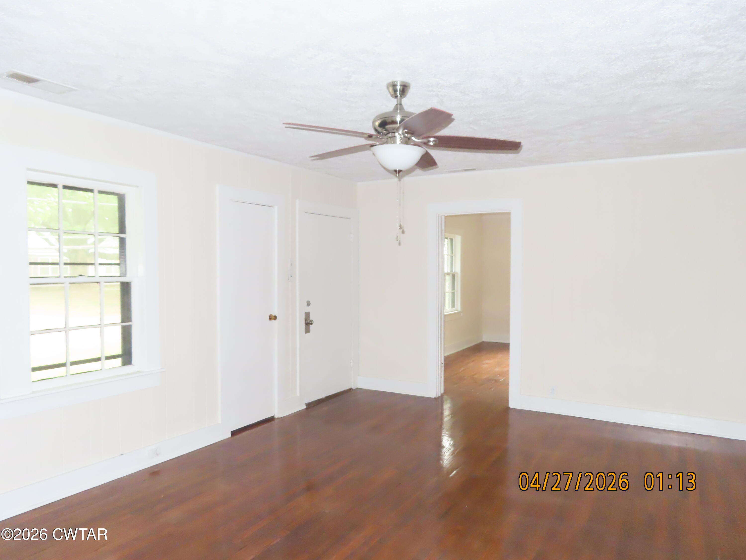 43 Bemis Lane Jackson, TN 38301 - Photo 3 of 18 a view of an empty room with a window