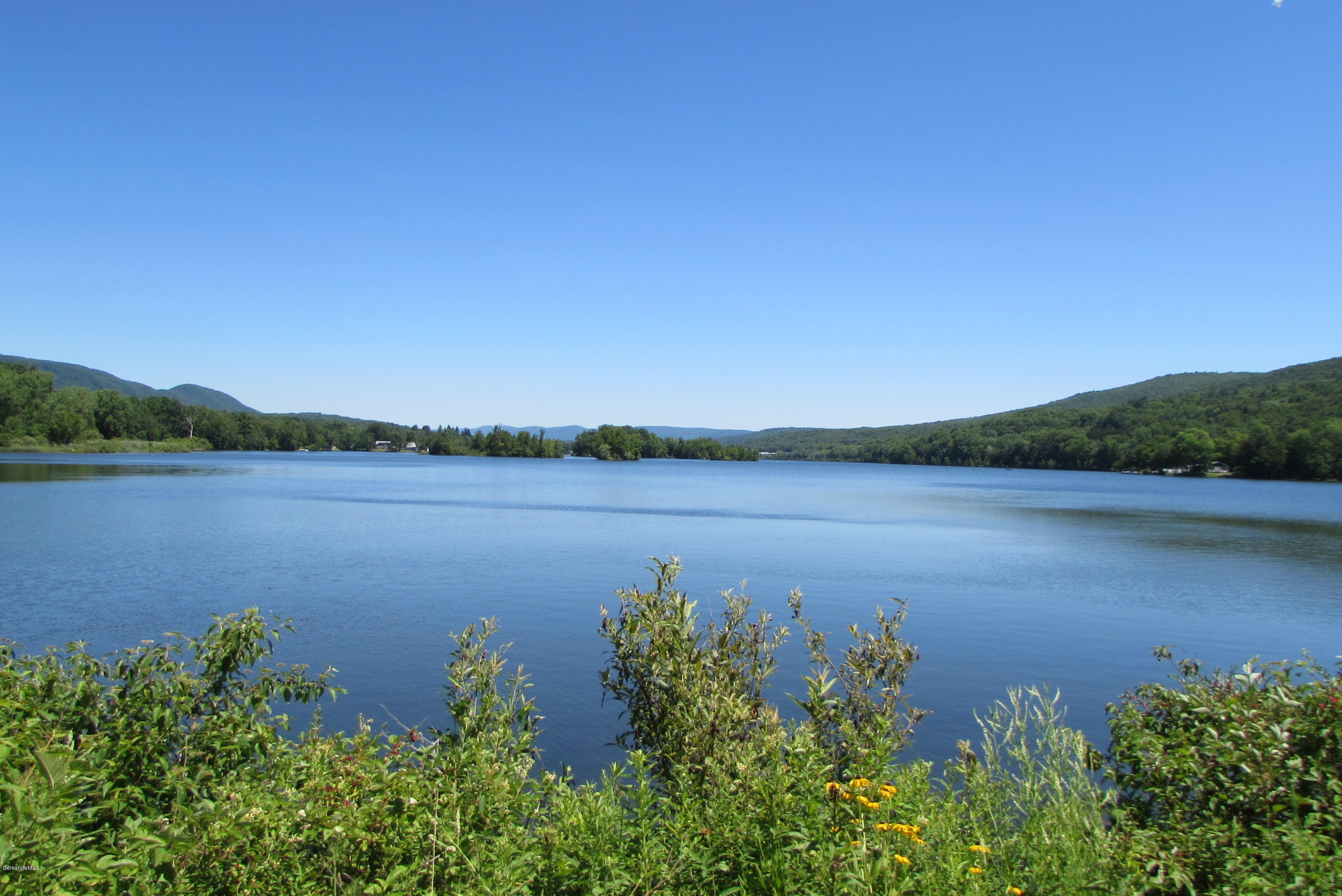 595 Lanesboro Road Cheshire, MA 01225 - Photo 2 of 32 a view of a lake with a lake