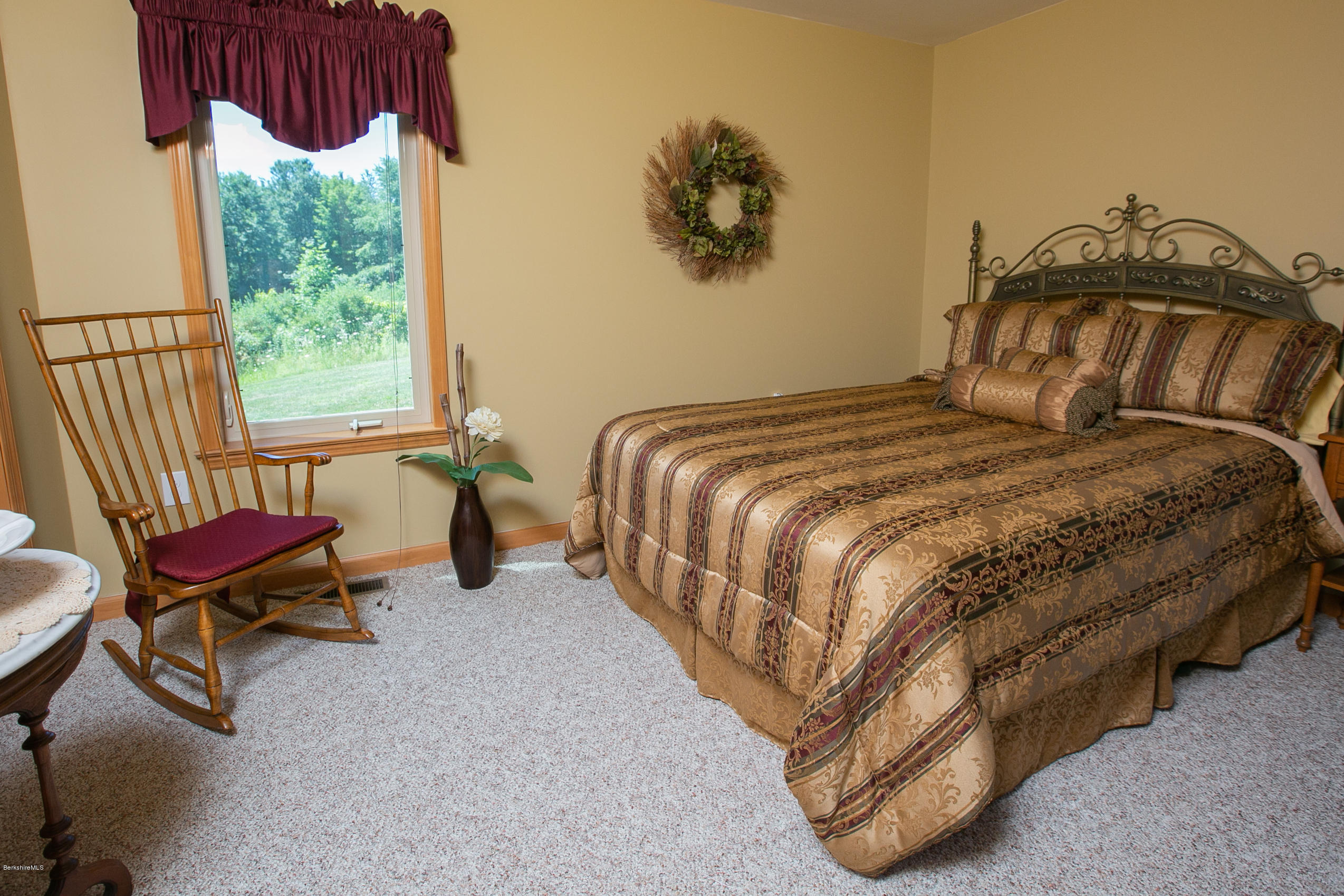 595 Lanesboro Road Cheshire, MA 01225 - Photo 15 of 32 a bedroom with a bed chair and window