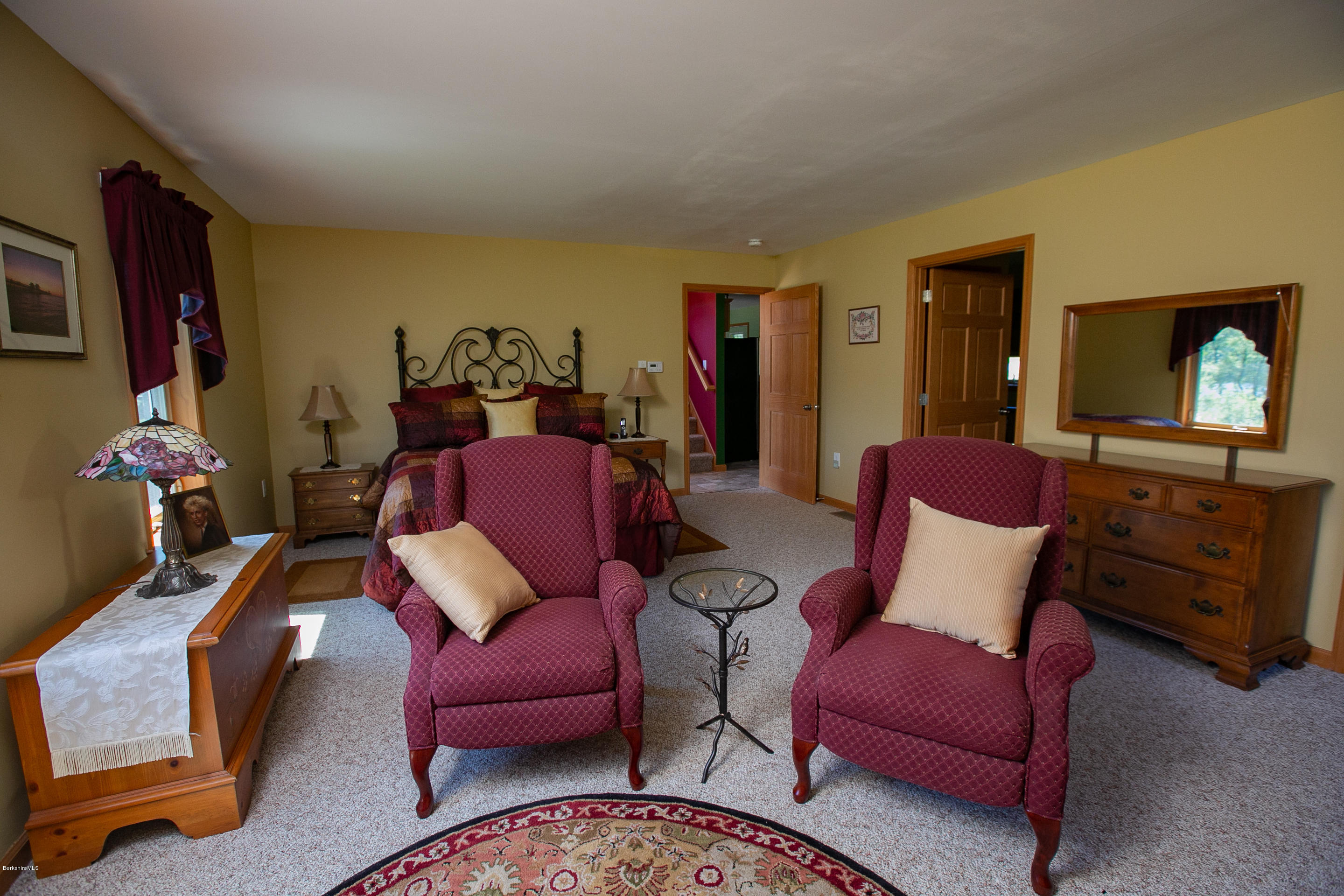 595 Lanesboro Road Cheshire, MA 01225 - Photo 16 of 32 a living room with furniture and a flat screen tv