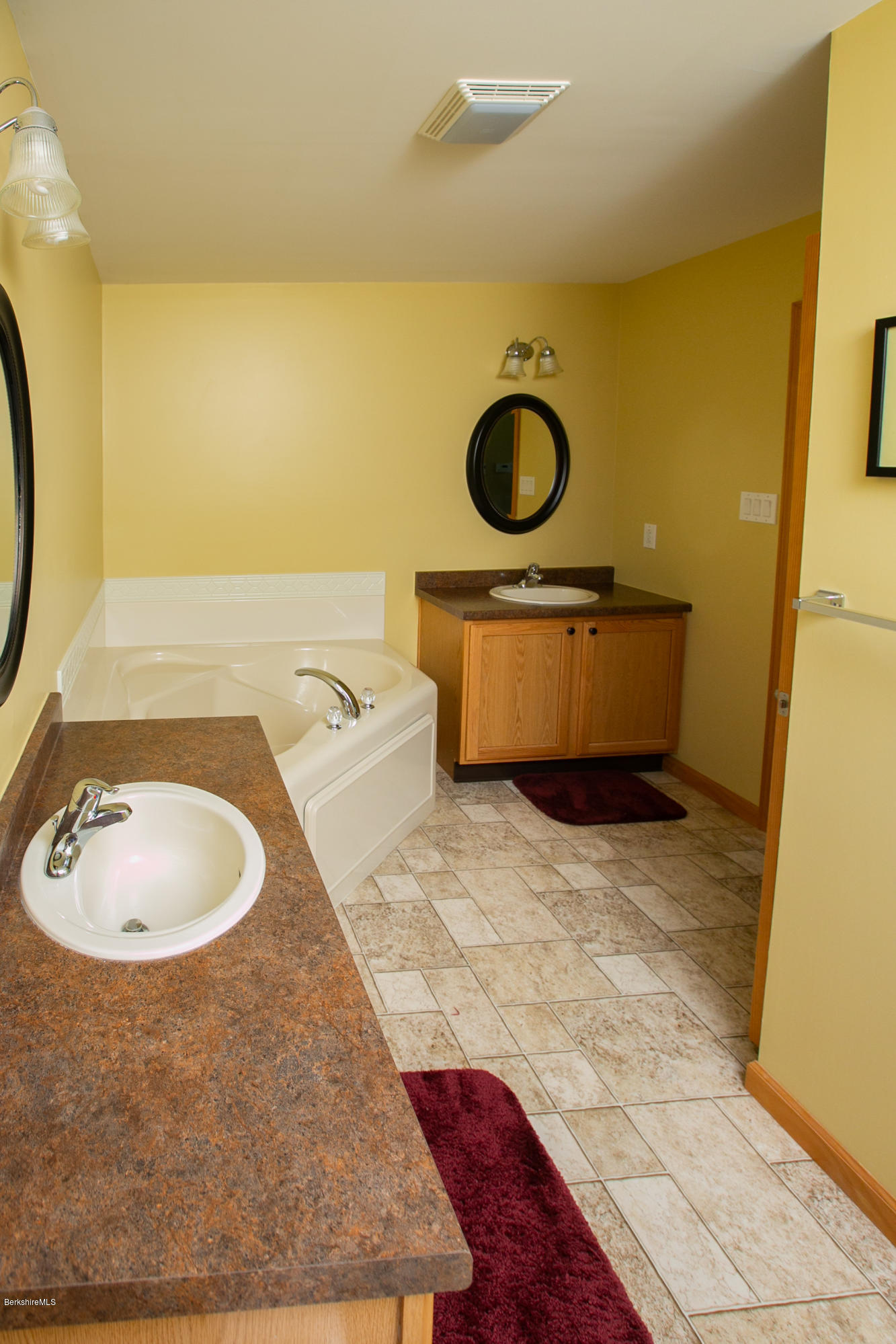 595 Lanesboro Road Cheshire, MA 01225 - Photo 18 of 32 a bathroom with a sink mirror and vanity