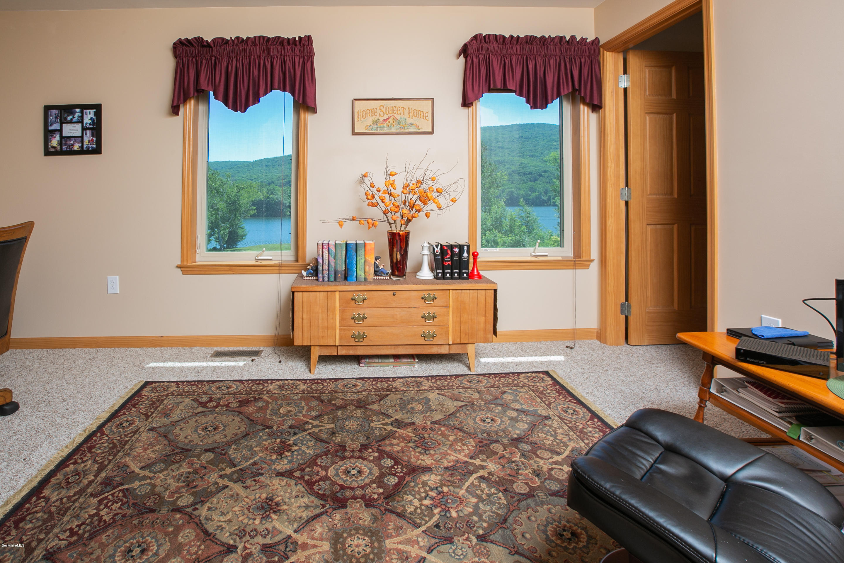 595 Lanesboro Road Cheshire, MA 01225 - Photo 19 of 32 a bedroom with a bed and window