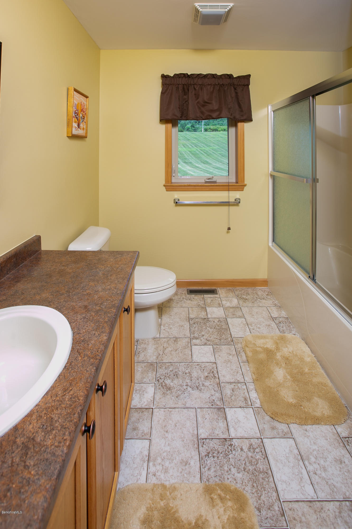 595 Lanesboro Road Cheshire, MA 01225 - Photo 21 of 32 a bathroom with a granite countertop sink and a toilet