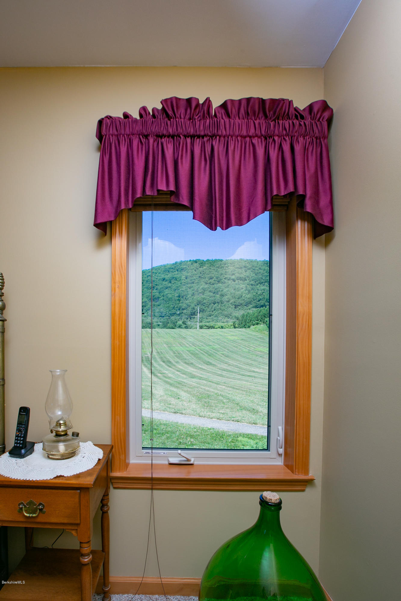 595 Lanesboro Road Cheshire, MA 01225 - Photo 22 of 32 a view of a bedroom with a bed and a window