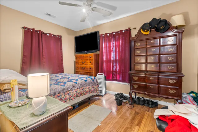 a view of a livingroom with furniture and windows