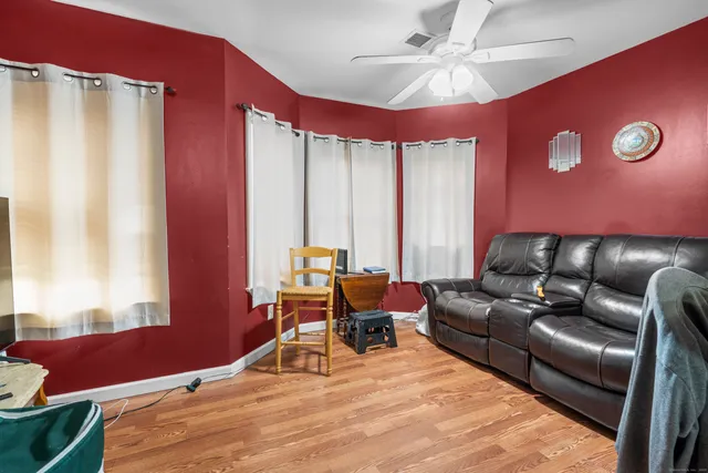 a kitchen with granite countertop a stove and a sink