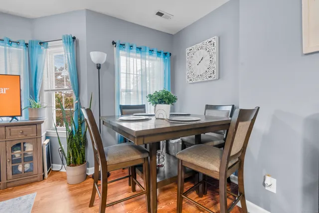 a view of a dining room with furniture