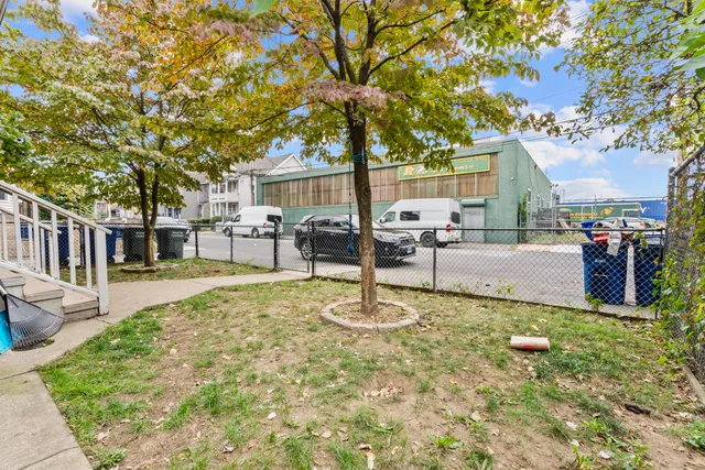 a kitchen with a sink a stove and refrigerator