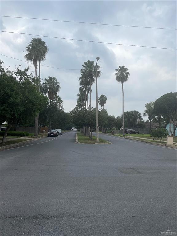 329 North 8th Street McAllen, TX 78501 - Photo 2 of 13 a view of a road with a yard