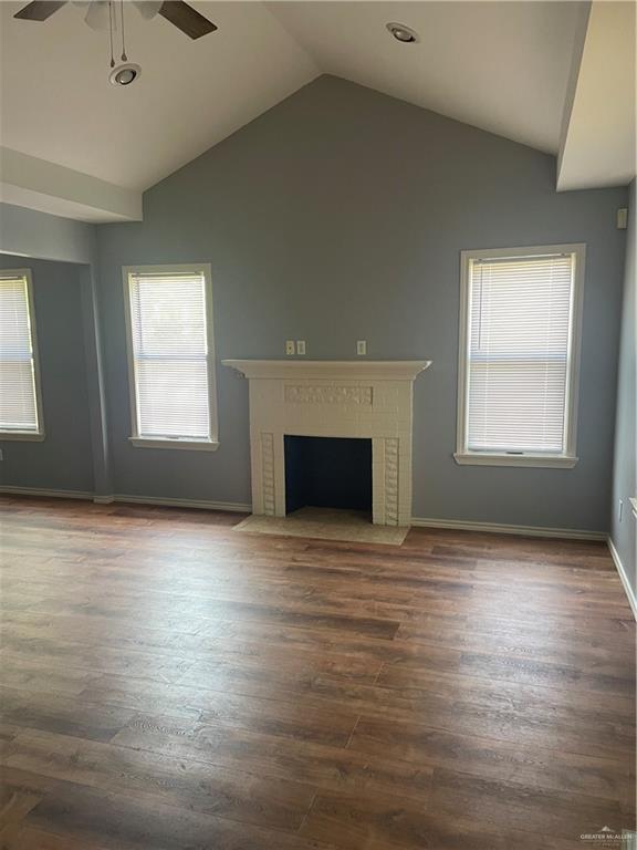 329 North 8th Street McAllen, TX 78501 - Photo 3 of 13 an empty room with windows and fireplace